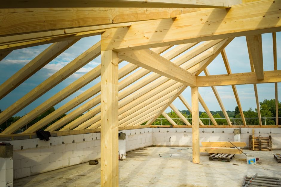 New roof rafters and trusses before insulation, the stage at which the vented or sealed attic decision is made