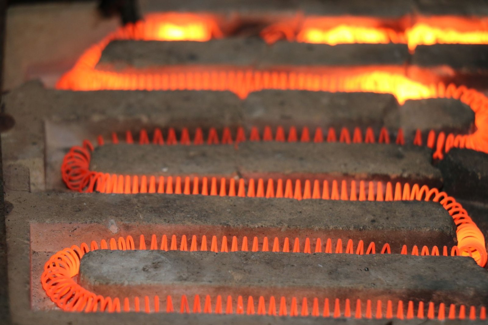 Glowing coiled element of an electric heater, the part that turns electricity into heat without adding any water to the air