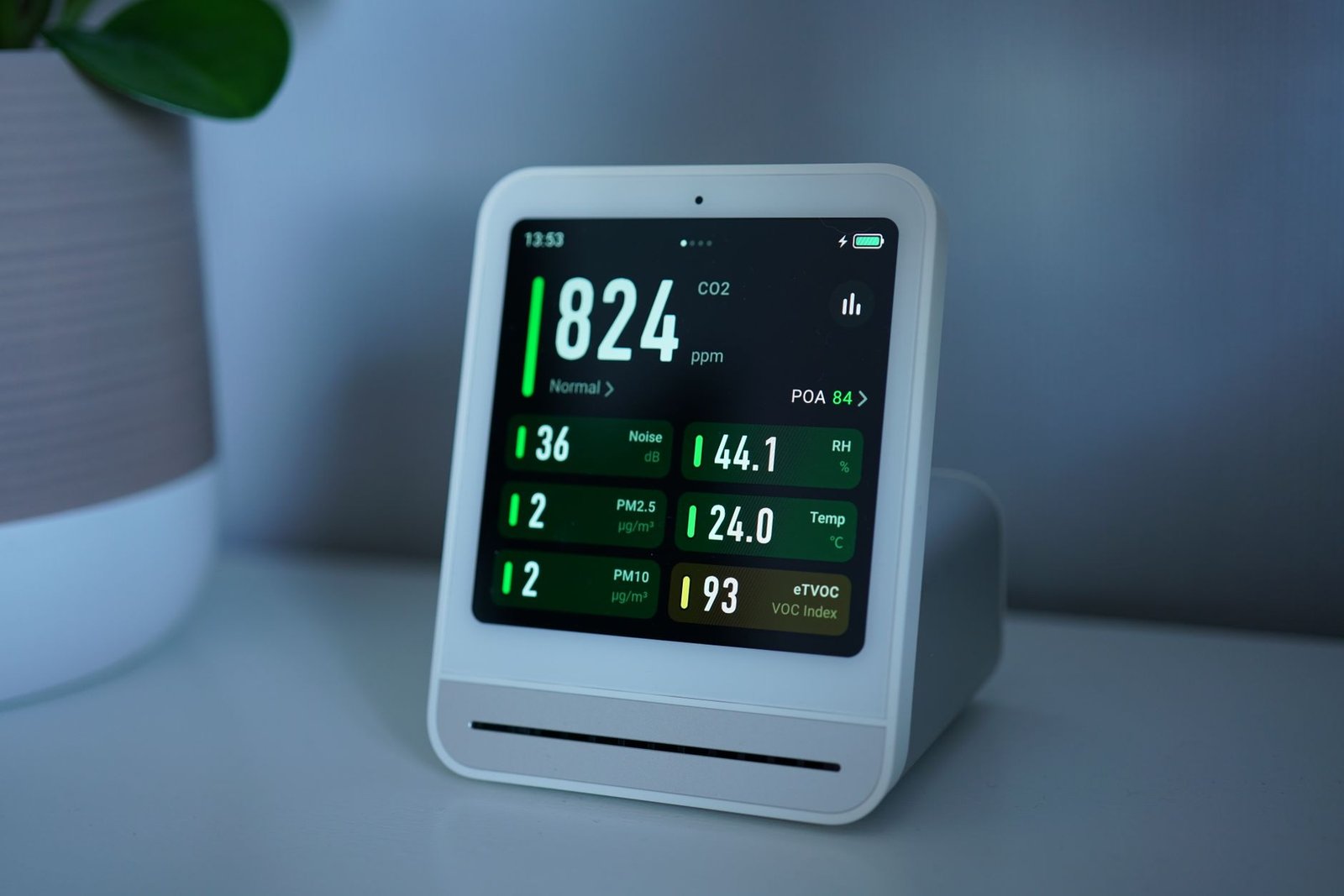Room air monitor on a shelf showing 44.1 percent relative humidity and 24 degrees Celsius
